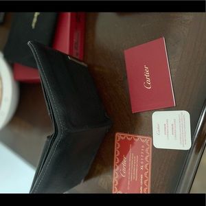 Authentic men’s leather Cartier wallet black.